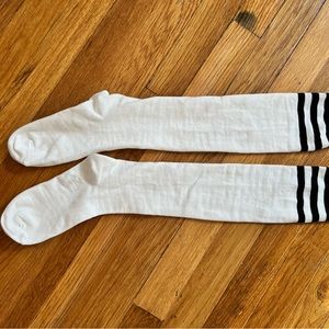 Never worn knee high socks in small size